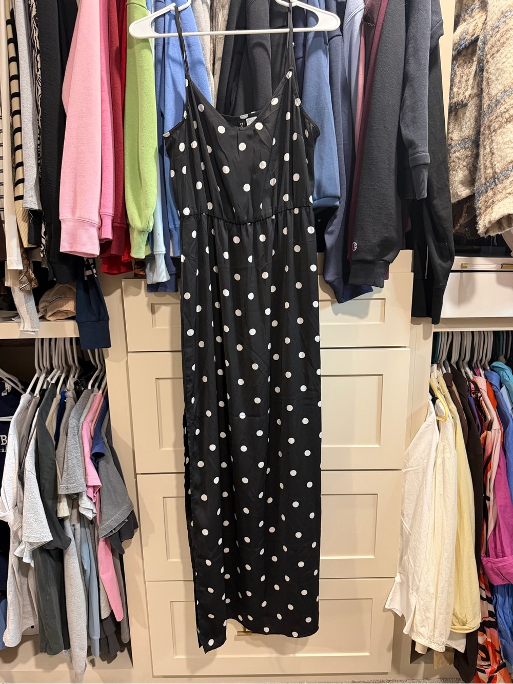 Black Polka Dot Sleeveless Maxi Dress has a slit on both sides